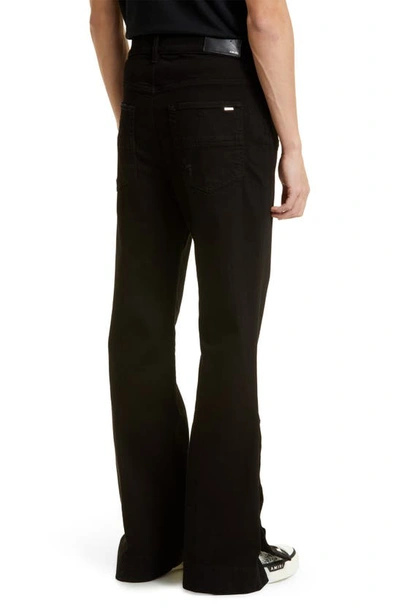 Shop Amiri Stack Stretch Flare Split Hem Jeans In Black Od