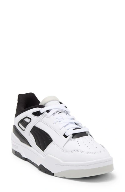 Shop Puma Slipstream Sneaker In  White-black-glacier Gray