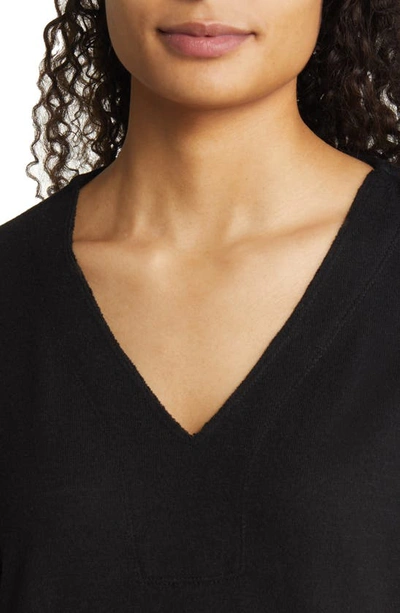 Shop Vince Camuto Ribbed Sleeve V-neck Top In Rich Black