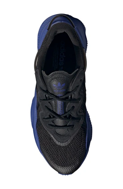 Shop Adidas Originals Ozweego Sneaker In Black/ Black/ Semi Lucid Blue