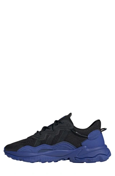 Shop Adidas Originals Ozweego Sneaker In Black/ Black/ Semi Lucid Blue