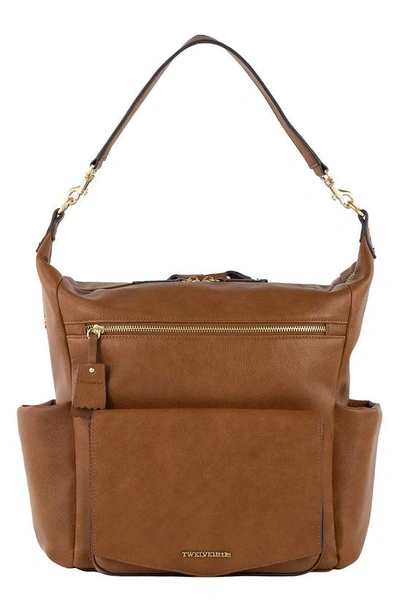 Shop Twelvelittle Peekaboo Faux Leather Convertible Diaper Backpack In Toffee