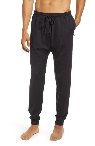 Shop Alo Yoga Alo Revitalize Drawstring Pants In Black