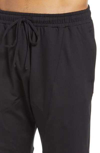Shop Alo Yoga Revitalize Drawstring Pants In Black