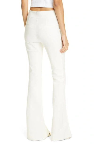Shop Derek Lam 10 Crosby Maeve Slit Hem Stretch Cotton Flare Trousers In Soft White