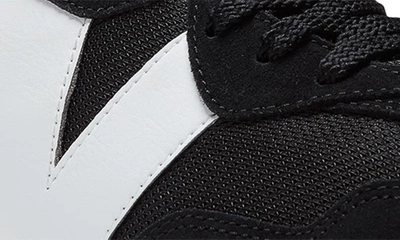 Shop New Balance Gender Inclusive 327 Sneaker In Black/ Black/ White