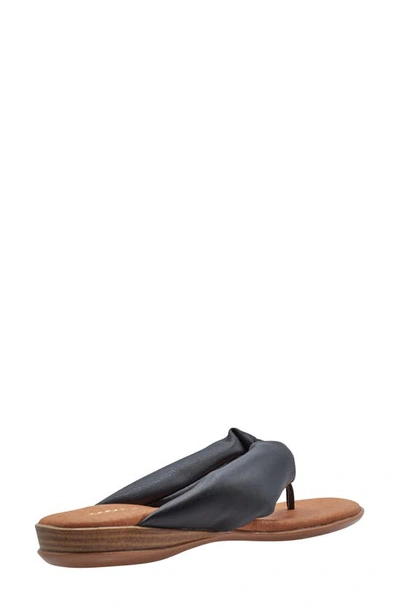 Shop Andre Assous Nuya Flip Flop In Black Leather