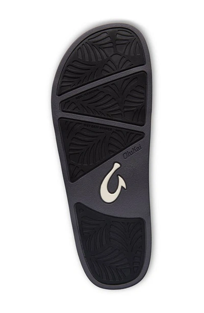 Shop Olukai Hila Water Resistant Slide Sandal In Black / Black