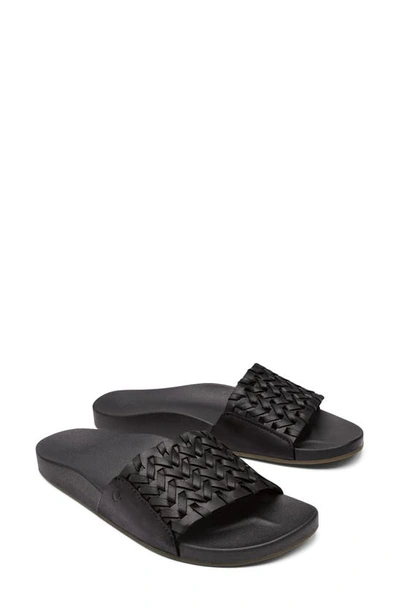 Shop Olukai Kamola Slide Sandal In Black / Black
