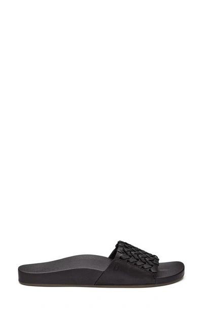 Shop Olukai Kamola Slide Sandal In Black / Black