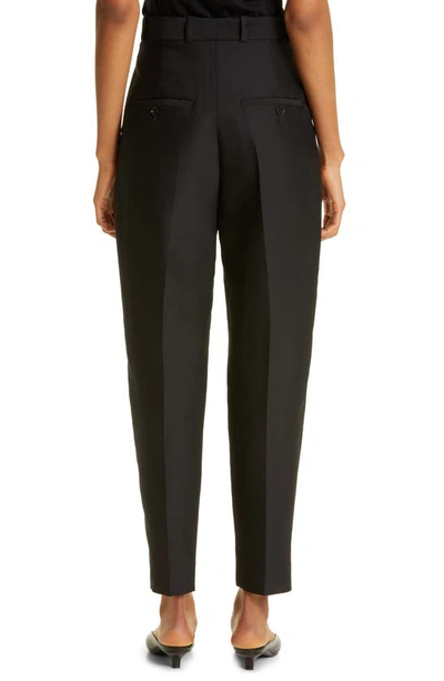 Shop Totême Pleated Evening Trousers In Black