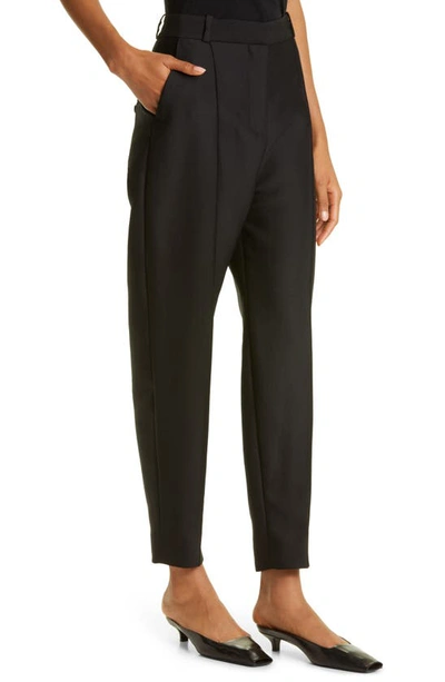 Shop Totême Pleated Evening Trousers In Black
