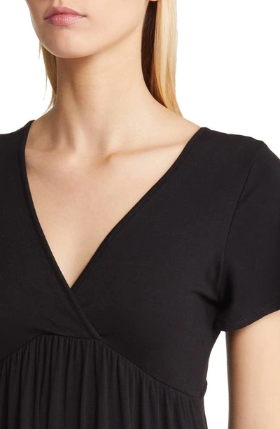 Shop Loveappella Tie Back Surplice V-neck Knit Minidress In Black