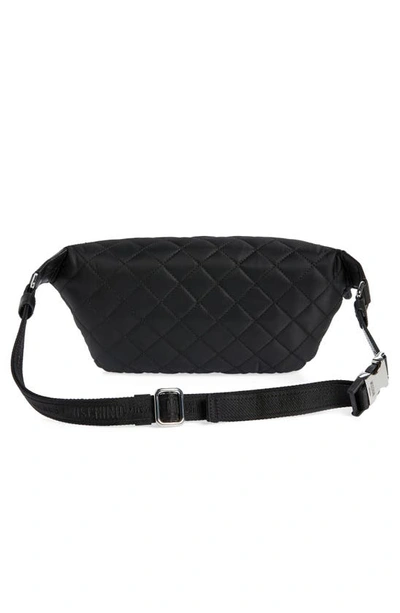 Shop Moschino Logo Quilted Nylon Belt Bag In Print Black
