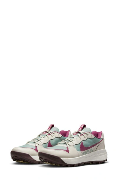 Shop Nike Acg Lowcate Hiking Sneaker In Mica Green/ Rosewood/ Bone