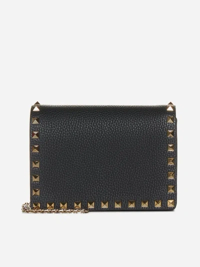 Shop Valentino Rockstud Leather Pouch Bag In Black