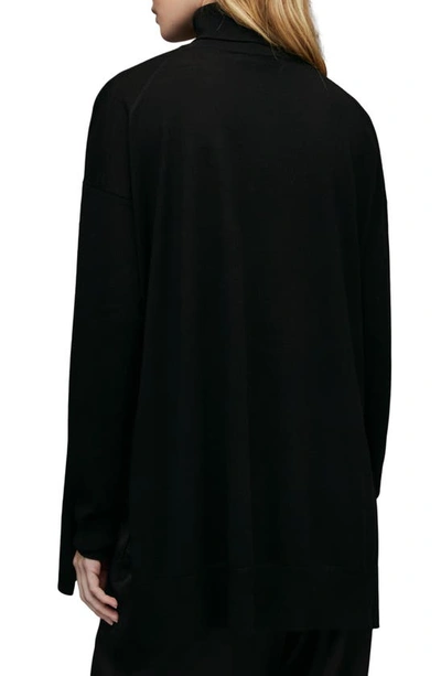 Shop Allsaints Gala Merino Wool Turtleneck Sweater In Black