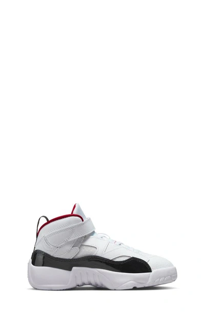 Shop Nike Kids' Jumpman Two Trey Sneaker In White/ Black/ Gym Red
