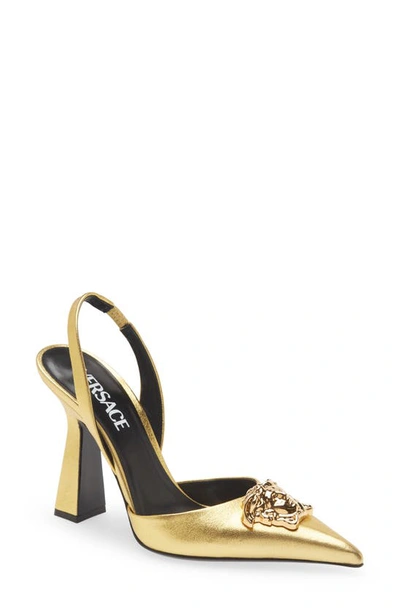 Shop Versace La Medusa Slingback Pointed Toe Pump In  Gold