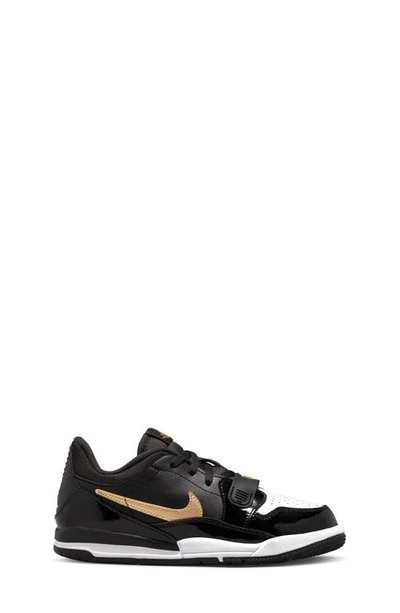 Shop Nike Air Jordan Legacy 312 Low Sneaker In Black/ Metallic Gold