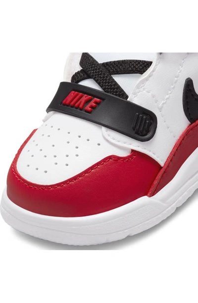 Shop Nike Jordan Legacy 312 Low Sneaker In White/ Black/ Gym Red