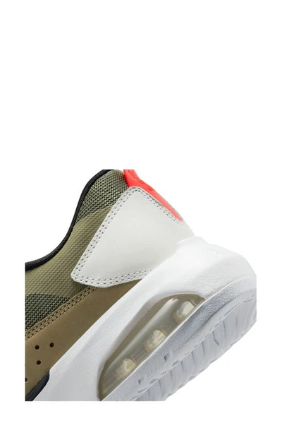 Shop Nike Jordan Air 200e Sneaker In Medium Olive/ Red/ White
