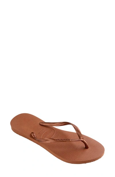 Shop Havaianas Slim Flip Flop In Rust/ Metallic Copper