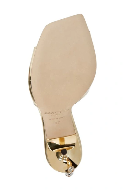 Shop Jimmy Choo Saeda Crystal Ankle Strap Peep Toe Sandal In Gold/ Crystal Honey