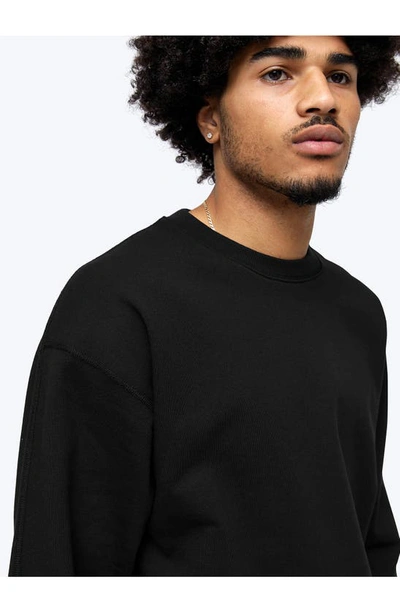 Shop Reigning Champ Midweight Terry Relaxed Crewneck Sweatshirt In Black