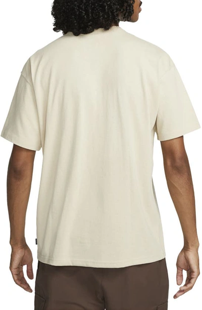 Shop Nike Sportswear Premium Essentials Pocket T-shirt In Rattan