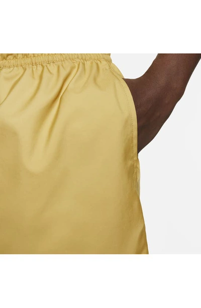 Shop Nike Woven Lined Flow Shorts In Wheat Gold/ White