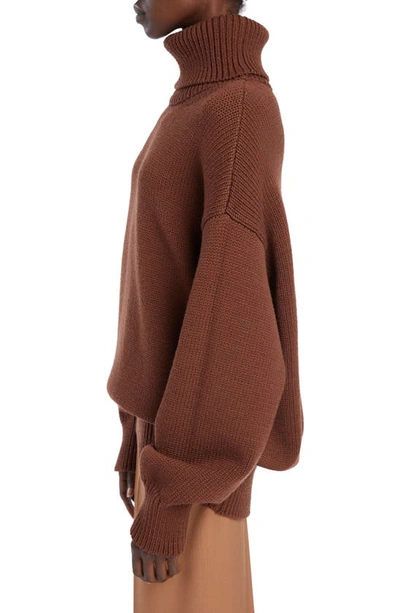 Shop The Row Ludo Oversize Turtleneck Sweater In Brown