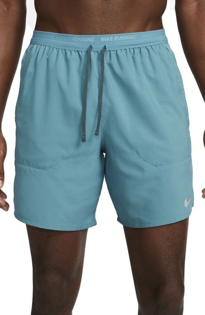 Shop Nike Dri-fit Stride 7-inch Brief-lined Running Shorts In Mineral Teal/ Faded Spruce
