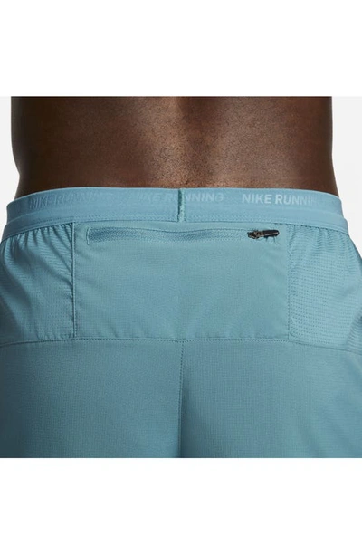 Shop Nike Dri-fit Stride 7-inch Brief-lined Running Shorts In Mineral Teal/ Faded Spruce
