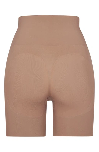Skims Seamless Sculpt Butt Enhancing Lifting Short In Clay In Sienna