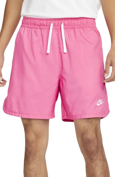 Shop Nike Woven Lined Flow Shorts In Pinksicle/ White