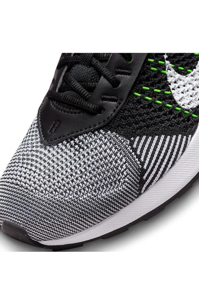 Shop Nike Air Max Flyknit Racer Sneaker In Black/ White-volt