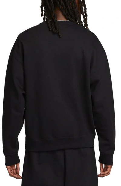 Shop Nike Solo Swoosh Oversize Crewneck Sweatshirt In Black/ White