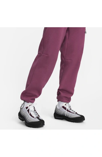 Shop Nike Tech Fleece Pants In Rosewood/ Black