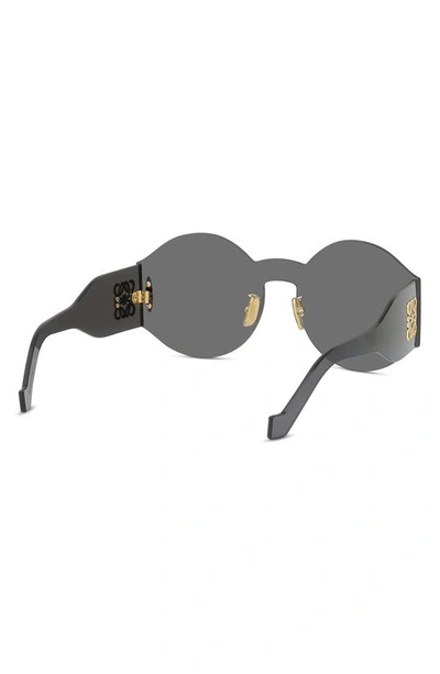 Shop Loewe Anagram Round Sunglasses In Shiny Black / Smoke