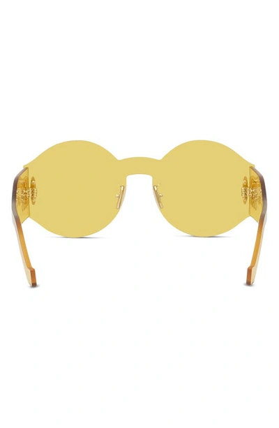 Shop Loewe Anagram Round Sunglasses In Shiny Yellow / Brown