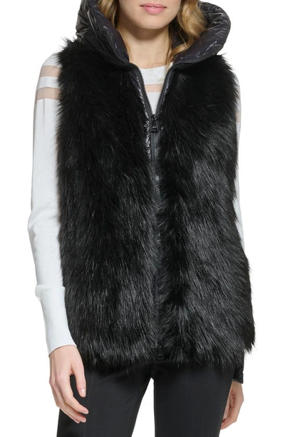 Shop Dkny Faux Fur Hooded Puffer Vest In Black