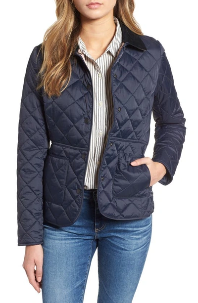 Shop Barbour Deveron Diamond Quilted Jacket In Navy/ Pale Pink
