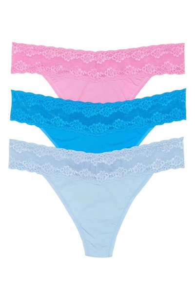 Shop Natori Bliss 3-pack Perfection Lace Trim Thongs In Vio/ Rn/ Blu