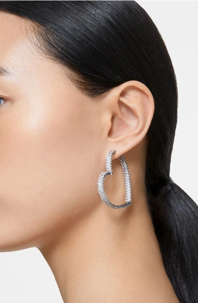 Shop Swarovski Matrix Crystal Heart Hoop Earrings In Silver