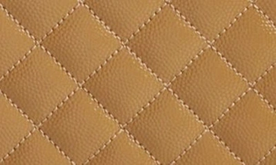 Shop Saint Laurent Medium Cassandra Quilted Leather Envelope Bag In 3331 Golden