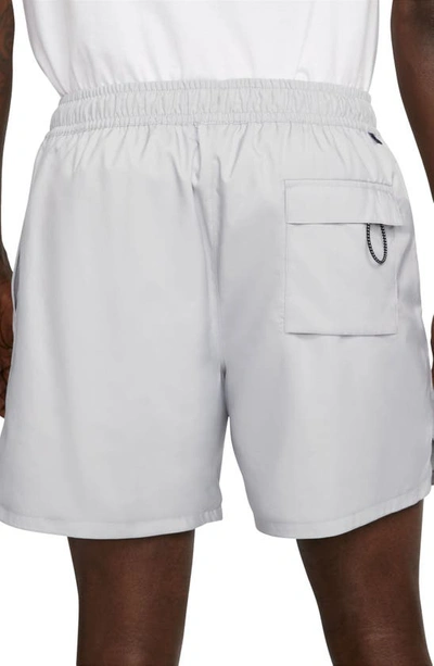 Shop Nike Woven Lined Flow Shorts In Lt Smoke Grey/ White