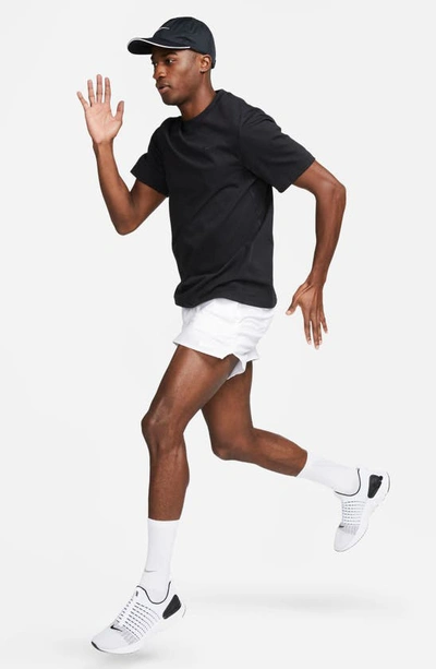 Shop Nike Primary Training Dri-fit Short Sleeve T-shirt In Black/ Black