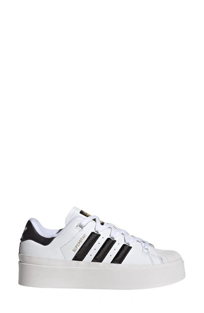 Shop Adidas Originals Superstar Bonega Platform Sneaker In White/ Black/ Gold Met.