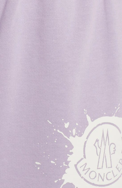Shop Moncler Splatter Logo Cotton Blend Graphic Sweat Shorts In Purple